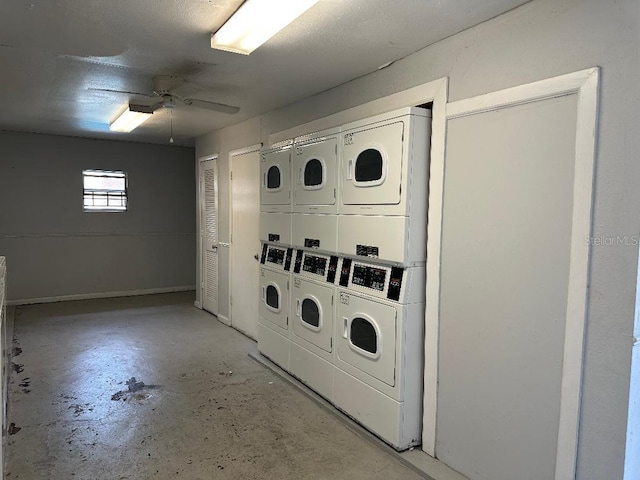 shared laundry room with estacked washer and dryer, a ceiling fan, separate washer and dryer, and baseboards