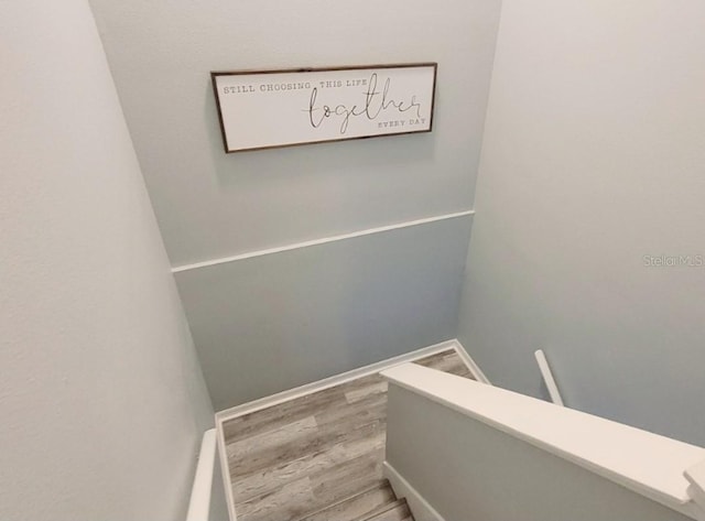 2729 Club Cortile Cir, Kissimmee, FL 34746 - stairs with wood finished floors