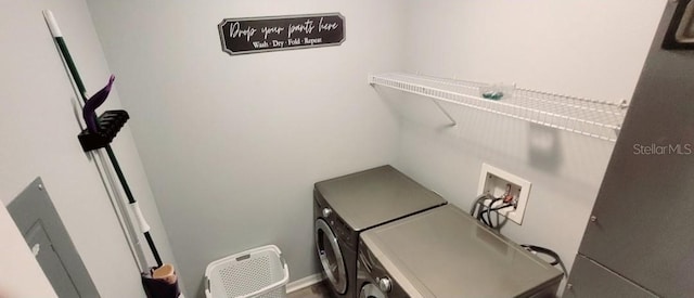 2729 Club Cortile Cir, Kissimmee, FL 34746 - washroom with washer and clothes dryer