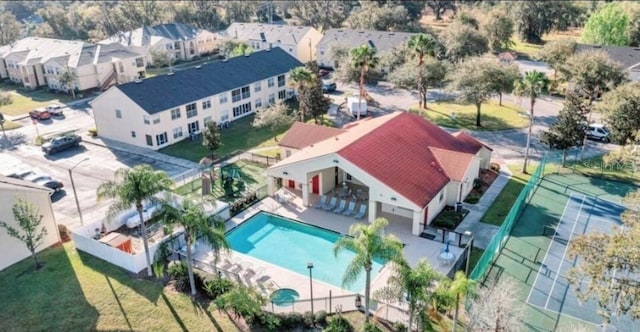 2729 Club Cortile Cir, Kissimmee, FL 34746 - view from above of property featuring a pool area