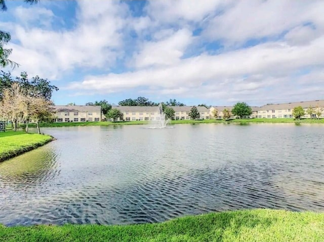 2729 Club Cortile Cir, Kissimmee, FL 34746 - water view featuring nearby suburban area