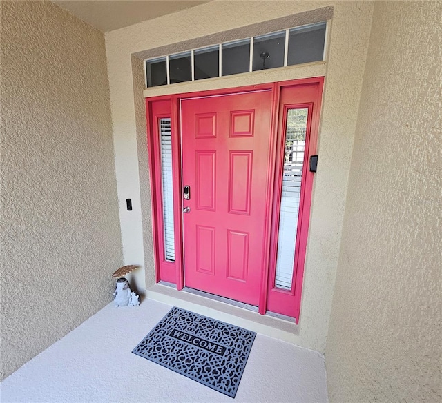 2531 Old Kent Cir, Kissimmee, FL 34758 - doorway to property featuring stucco siding