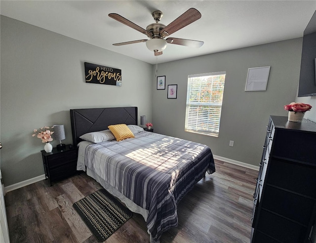 2531 Old Kent Cir, Kissimmee, FL 34758 - bedroom with dark wood-type flooring, baseboards, and a ceiling fan