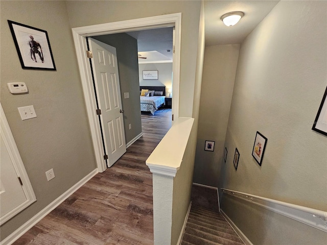 2531 Old Kent Cir, Kissimmee, FL 34758 - stairway featuring wood finished floors and baseboards