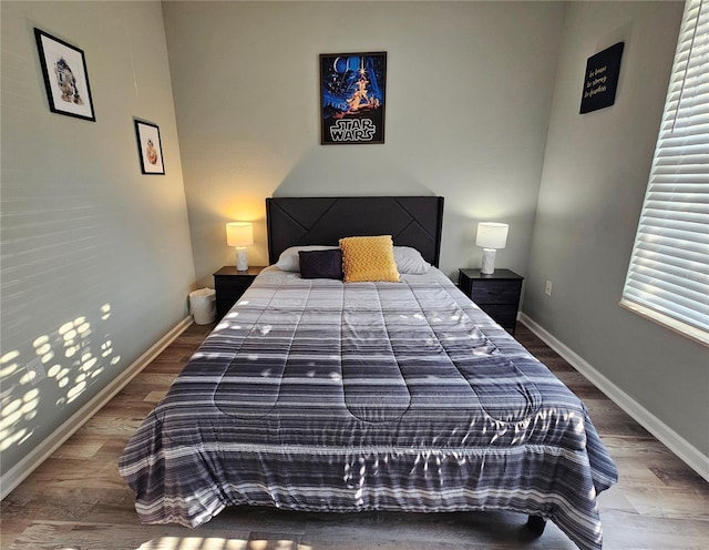 2531 Old Kent Cir, Kissimmee, FL 34758 - bedroom featuring baseboards and wood finished floors