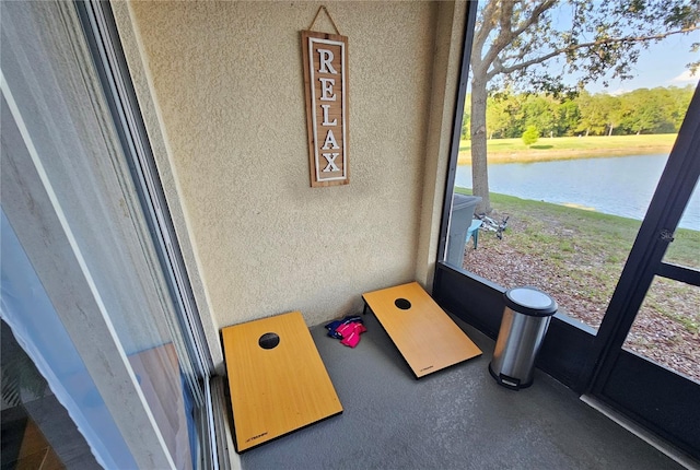 2531 Old Kent Cir, Kissimmee, FL 34758 - unfurnished sunroom featuring a water view