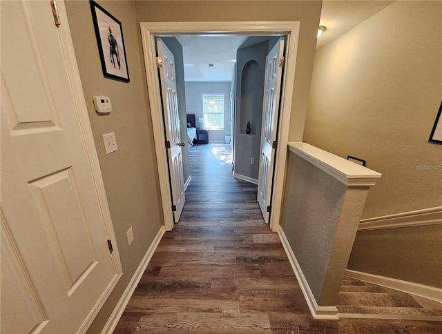 2531 Old Kent Cir, Kissimmee, FL 34758 - corridor with dark wood-type flooring and baseboards