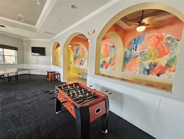 2531 Old Kent Cir, Kissimmee, FL 34758 - game room with a ceiling fan, a tray ceiling, ornamental molding, wainscoting, and carpet