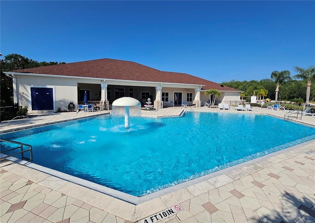 2531 Old Kent Cir, Kissimmee, FL 34758 - community pool with a patio area