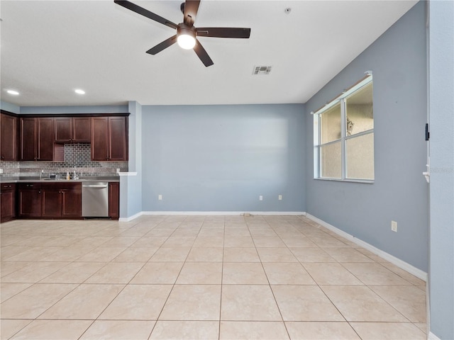 kitchen featuring ceiling fan, light countertops, stainless steel dishwasher, backsplash, and dark brown cabinets