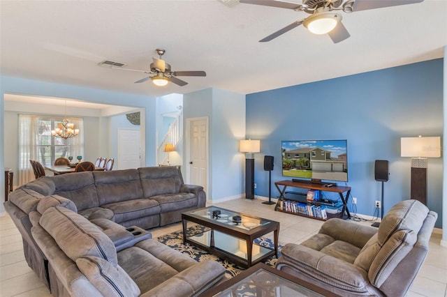 8571 La Isla Dr, Kissimmee, FL 34747 - tiled living area featuring ceiling fan and a chandelier