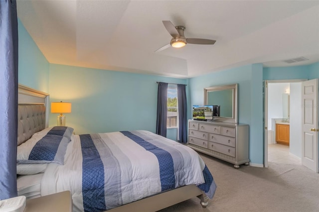 8571 La Isla Dr, Kissimmee, FL 34747 - bedroom featuring light carpet and ceiling fan