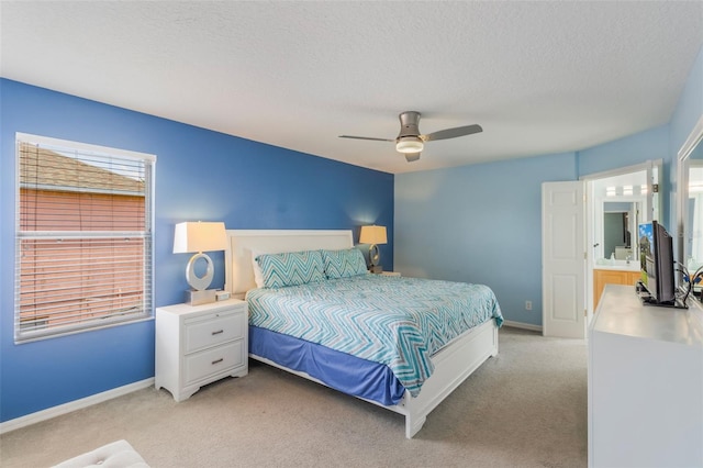 8571 La Isla Dr, Kissimmee, FL 34747 - bedroom featuring light carpet, a textured ceiling, and ceiling fan