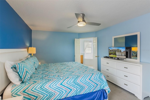 8571 La Isla Dr, Kissimmee, FL 34747 - bedroom with light colored carpet and ceiling fan
