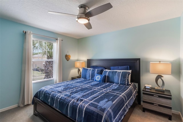 8571 La Isla Dr, Kissimmee, FL 34747 - carpeted bedroom featuring a textured ceiling and ceiling fan