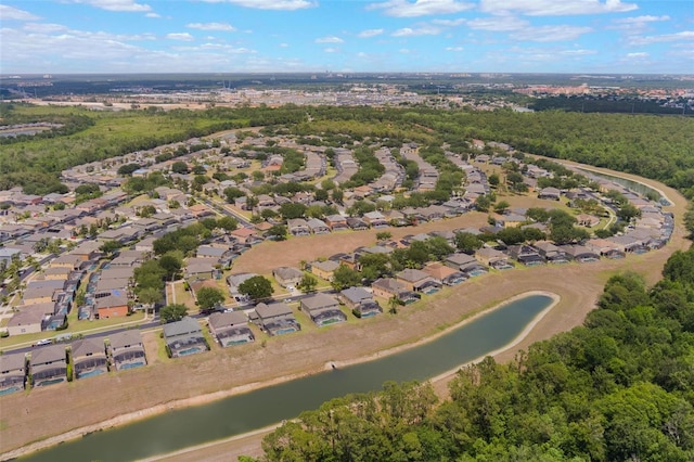 8571 La Isla Dr, Kissimmee, FL 34747 - aerial view of property and surrounding area featuring nearby suburban area and a large body of water