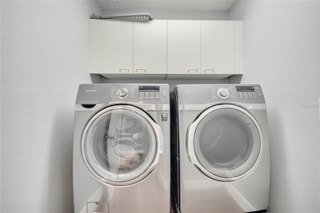 5768 Los Palma Vista Dr, Orlando, FL 32837 - laundry area featuring cabinet space and independent washer and dryer