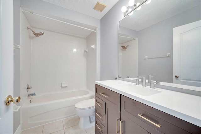 5768 Los Palma Vista Dr, Orlando, FL 32837 - bathroom featuring tile patterned flooring, toilet, shower / washtub combination, vanity, and a textured ceiling