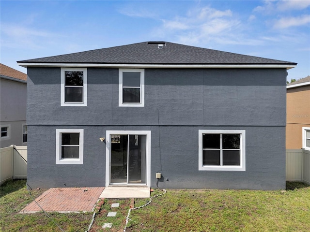 5768 Los Palma Vista Dr, Orlando, FL 32837 - rear view of property with stucco siding
