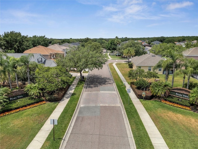 5768 Los Palma Vista Dr, Orlando, FL 32837 - view of home's community featuring a residential view and a yard