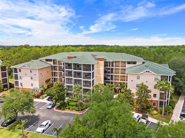 3060 Pirates Retreat Ct Unit 309, Kissimmee, FL 34747 - bird's eye view of apartment complex / building and a heavily wooded area
