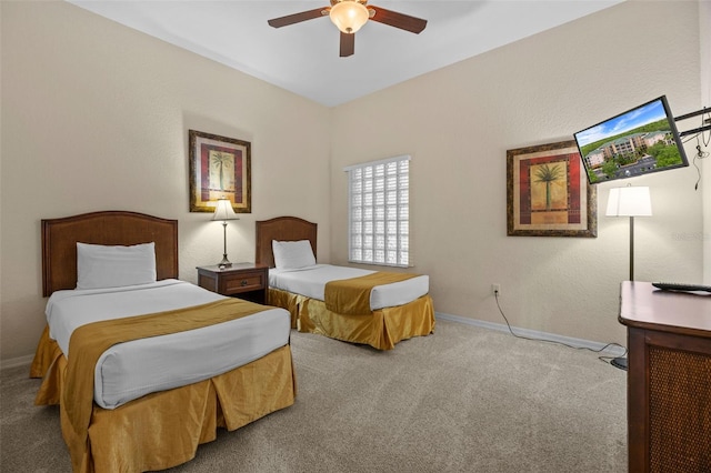 3060 Pirates Retreat Ct Unit 309, Kissimmee, FL 34747 - carpeted bedroom with baseboards and ceiling fan