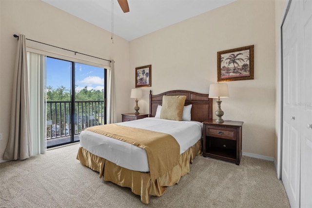 3060 Pirates Retreat Ct Unit 309, Kissimmee, FL 34747 - carpeted bedroom with access to exterior, baseboards, and ceiling fan