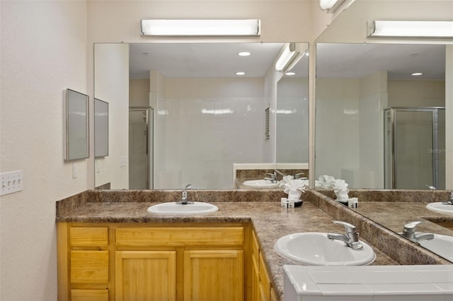 3060 Pirates Retreat Ct Unit 309, Kissimmee, FL 34747 - bathroom with a stall shower and double vanity