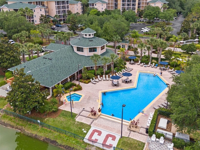 3060 Pirates Retreat Ct Unit 309, Kissimmee, FL 34747 - community pool with a patio area and fence