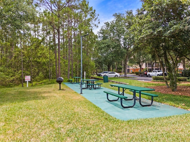 3060 Pirates Retreat Ct Unit 309, Kissimmee, FL 34747 - view of property's community featuring a yard
