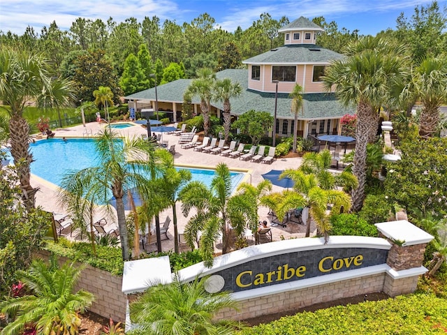 3060 Pirates Retreat Ct Unit 309, Kissimmee, FL 34747 - community pool with a hot tub and a patio