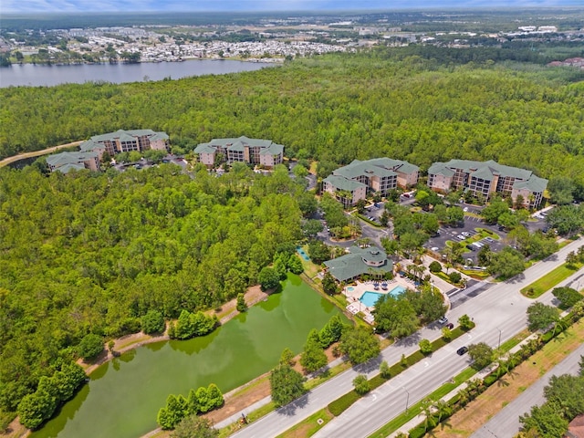 3060 Pirates Retreat Ct Unit 309, Kissimmee, FL 34747 - drone / aerial view of a forest and a large body of water