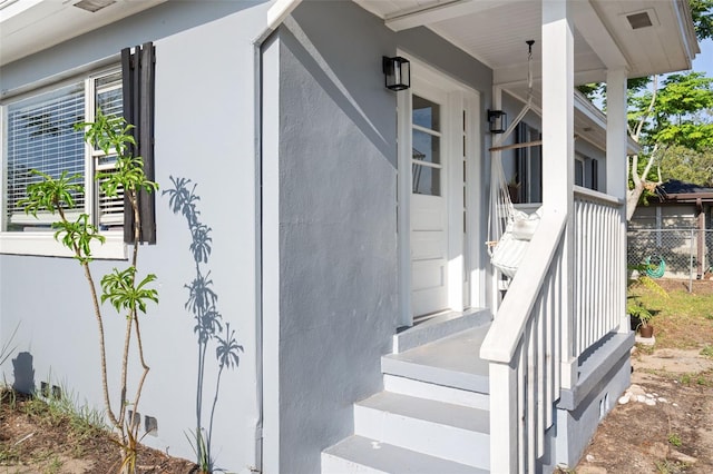 1024 Cohassett Ave, Lake Wales, FL 33853 - property entrance with stucco siding