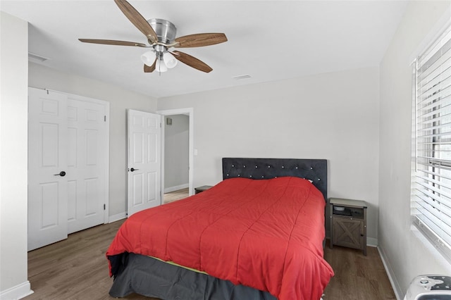 1024 Cohassett Ave, Lake Wales, FL 33853 - bedroom with wood finished floors, baseboards, and a ceiling fan