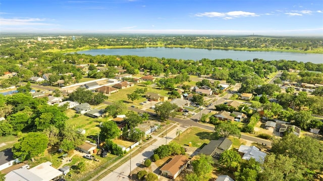 1024 Cohassett Ave, Lake Wales, FL 33853 - aerial view of property and surrounding area with a nearby body of water, nearby suburban area, and a tree filled landscape