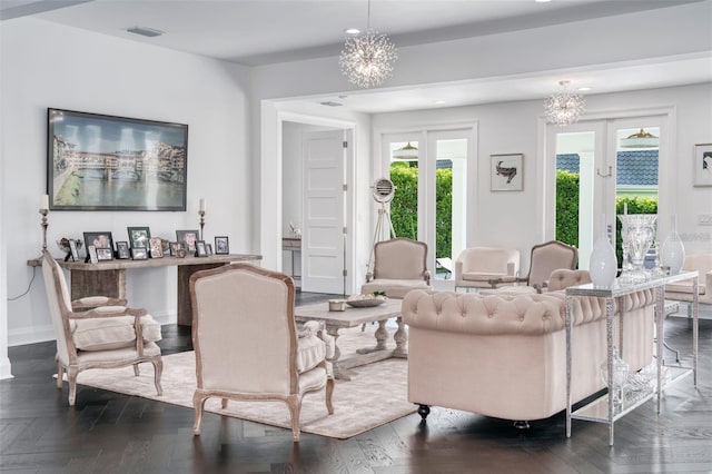 423 Arbor Cir, Celebration, FL 34747 - living area featuring a chandelier and baseboards