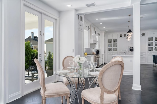 423 Arbor Cir, Celebration, FL 34747 - dining room with french doors, recessed lighting, dark wood-style flooring, and baseboards