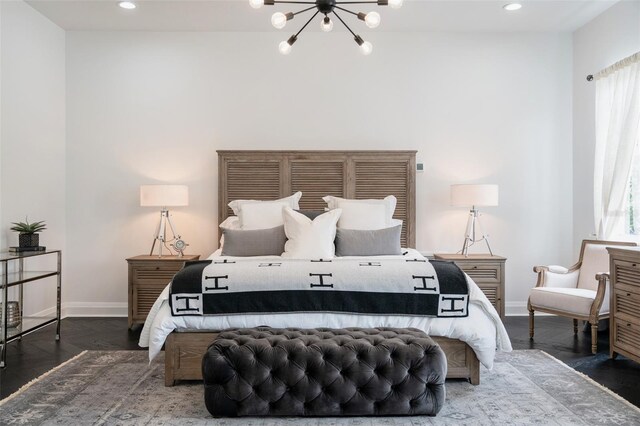 423 Arbor Cir, Celebration, FL 34747 - bedroom featuring baseboards, a chandelier, recessed lighting, wood finished floors, and multiple windows