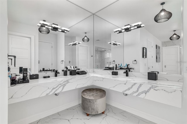 423 Arbor Cir, Celebration, FL 34747 - bathroom featuring a shower stall, marble finish floors, and vanity