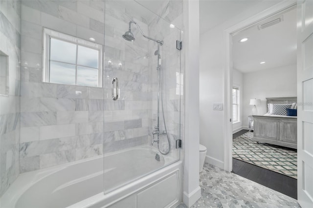 423 Arbor Cir, Celebration, FL 34747 - bathroom with baseboards, toilet, recessed lighting, and shower / bath combination with glass door