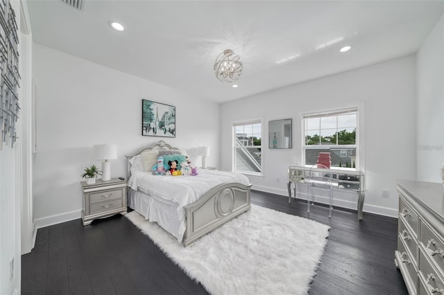 423 Arbor Cir, Celebration, FL 34747 - bedroom featuring dark wood-style floors, recessed lighting, baseboards, and a chandelier