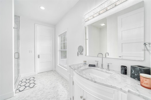 423 Arbor Cir, Celebration, FL 34747 - bathroom with a shower stall, vanity, recessed lighting, and baseboards