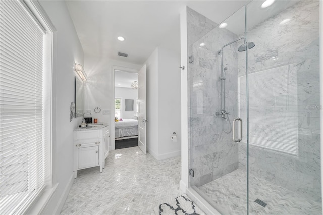 423 Arbor Cir, Celebration, FL 34747 - ensuite bathroom with recessed lighting, vanity, a marble finish shower, and baseboards