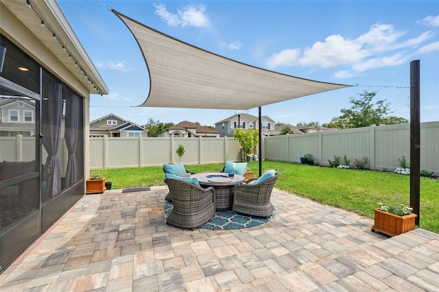 view of patio / terrace with an outdoor fire pit