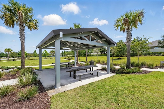 view of property's community with a gazebo and a lawn
