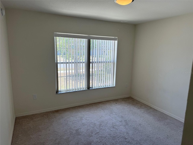 369 St Georges Cir, Eagle Lake, FL 33839 - carpeted empty room with plenty of natural light