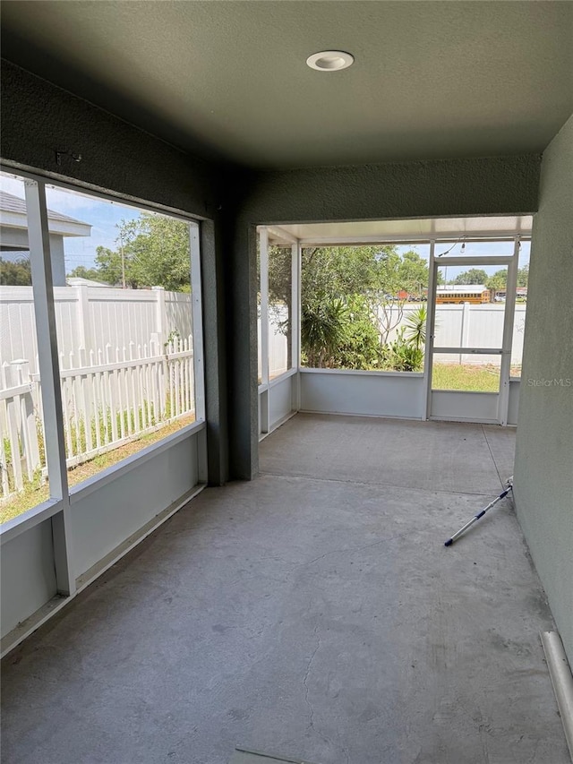 369 St Georges Cir, Eagle Lake, FL 33839 - unfurnished sunroom featuring plenty of natural light