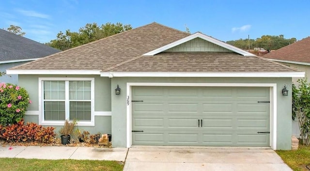 369 St Georges Cir, Eagle Lake, FL 33839 - view of front of property with roof with shingles, stucco siding, and concrete driveway