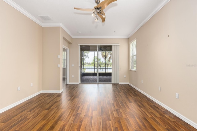 2376 Palm Tree Dr, Kissimmee, FL 34759 - spare room with wood finished floors, ceiling fan, crown molding, and baseboards