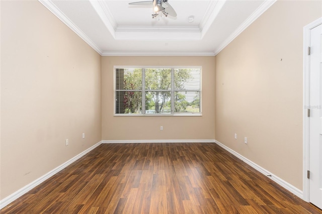 2376 Palm Tree Dr, Kissimmee, FL 34759 - unfurnished room featuring a raised ceiling, wood finished floors, ceiling fan, baseboards, and ornamental molding